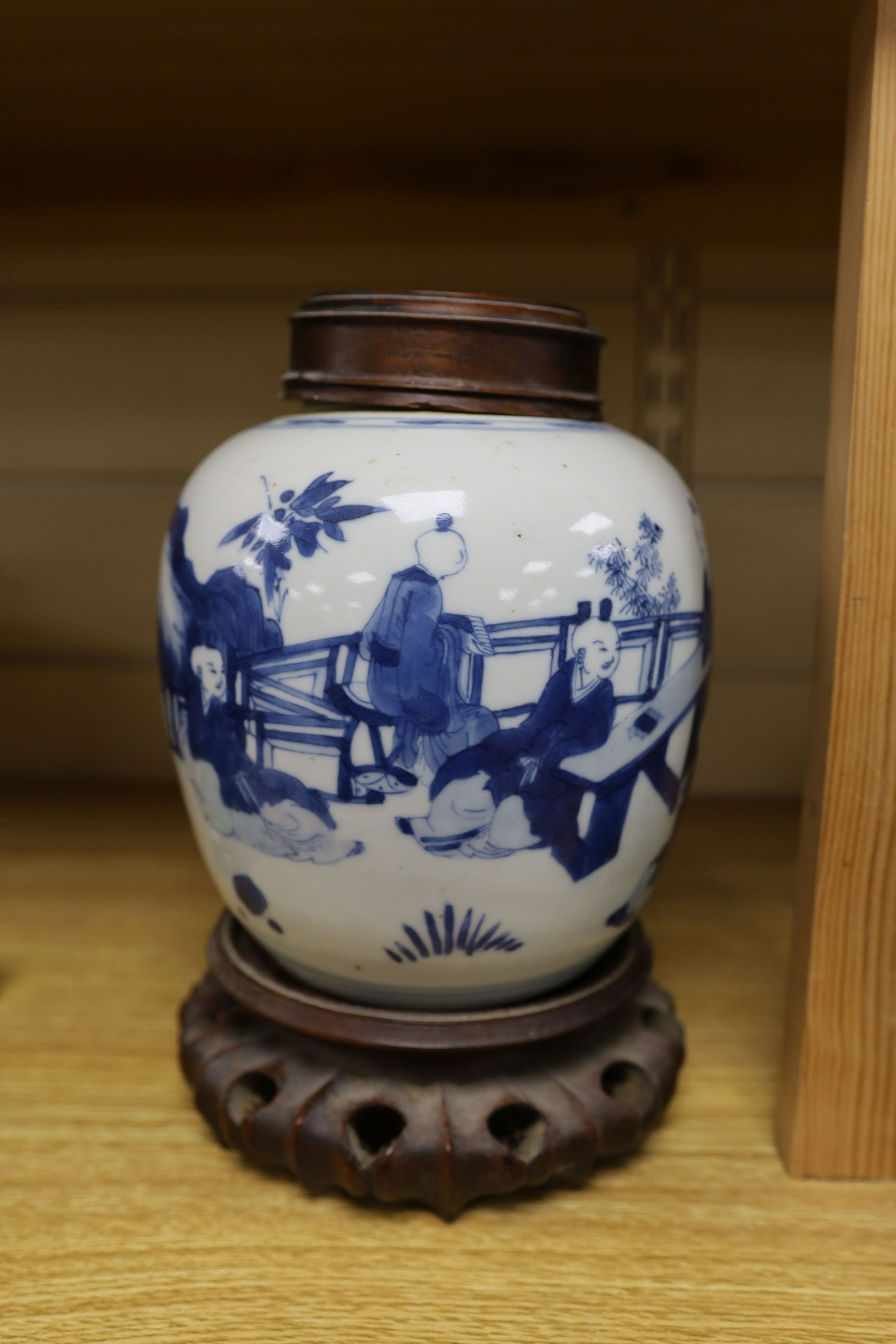 A Chinese blue and white 'boys' jar, 19th century, wood cover and stand, total height 24cm high